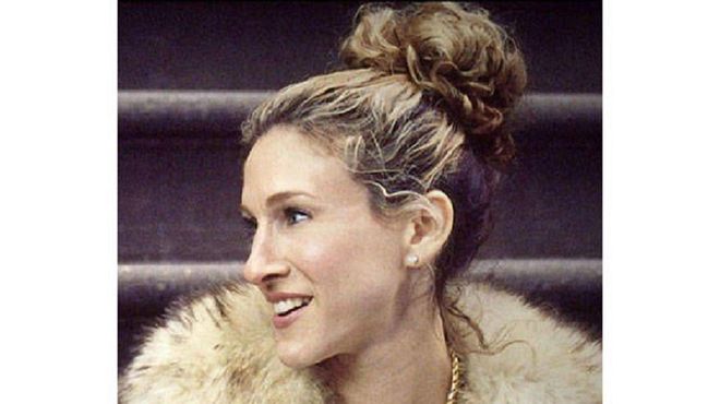 Sex and the City solidified Sarah Jessica Parker—and her hair—as iconic. We love how her character, Carrie, piled her wild curls in an effortless oversized bun and still want to rock this look today.