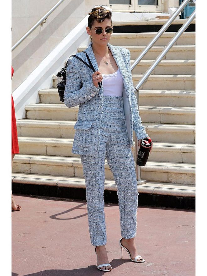 8 May: Kristen Stewart also opted for a trouser suit in the form of this tweed offering by Chanel. She paired it with strappy heels and a chic backpack.

Photo: Getty