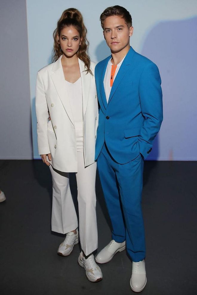 Barbara Palvin and Dylan Sprouse wore matching tailoring to sit front row at the Boss suit.

Photo: Getty Images