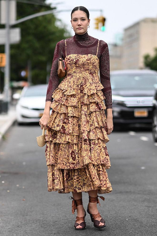NEW YORK, NEW YORK - SEPTEMBER 11: A guest is seen wearing a floral Ulla Johnson dres outside the Ulla Johnson show during New York Fashion Week S/S 2023 on September 11, 2022 in the borough of Brooklyn, New York. (Photo by Daniel Zuchnik/Getty Images)