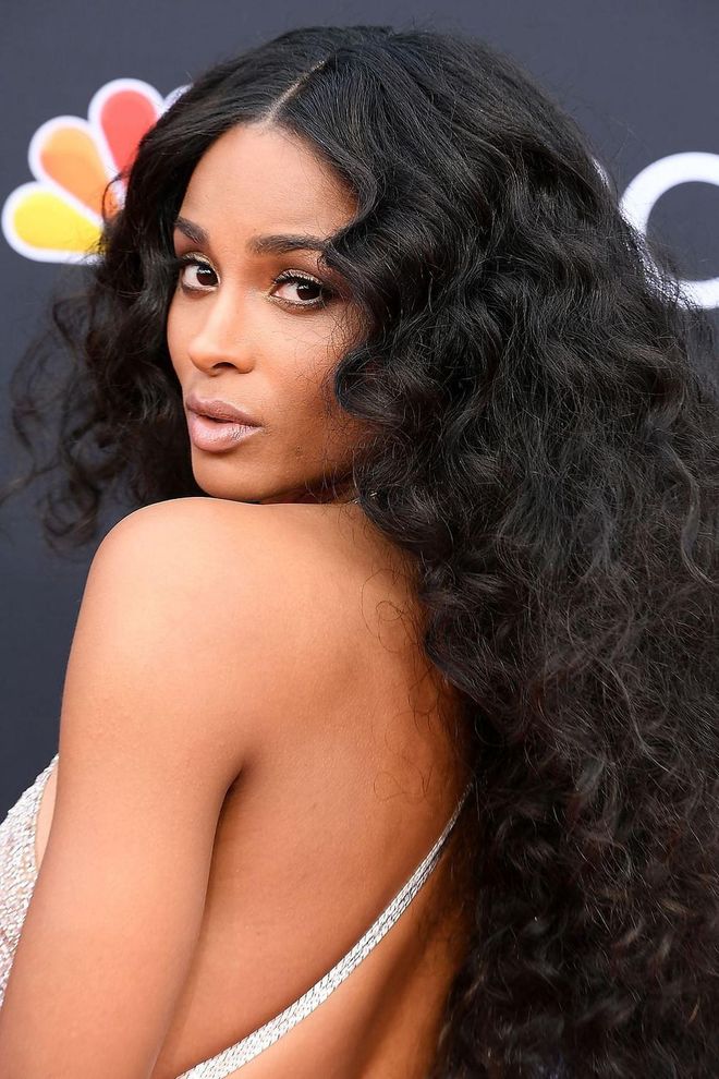 We love the look of dramatic ringlets for fall. To avoid full poof, take a cue from Ciara and keep the few inches closest to the roots sleek so all of the volume builds through the mid-lengths and ends.
Photo: Getty
