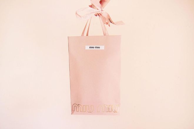 Miu Miu's pastel pink packaging goes perfectly with the feminine, bejeweled clothing and accessories that the brand is famous for. 