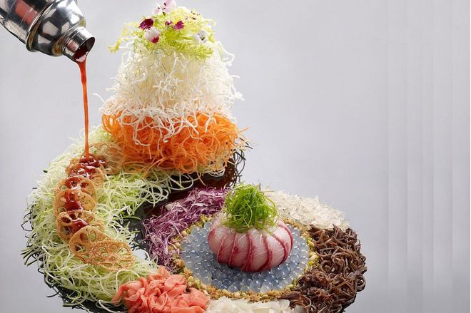 Pearls of Prosperity Kanpachi Kingfish Yu Sheng, $68++ for 4-6 persons. Reunion Set Menus ranges from $128++ per person to $1,288++ for a table of 10
