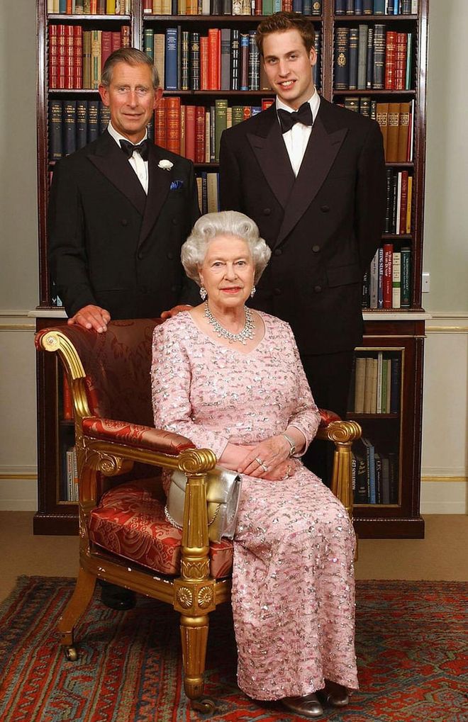 Queen Elizabeth II sits in front of her son Prince Charles (second in line for the throne) and Prince William (third in line for the throne) at the 50th anniversary of her coronation. The photo was taken at Clarence House, Charles' official residence.