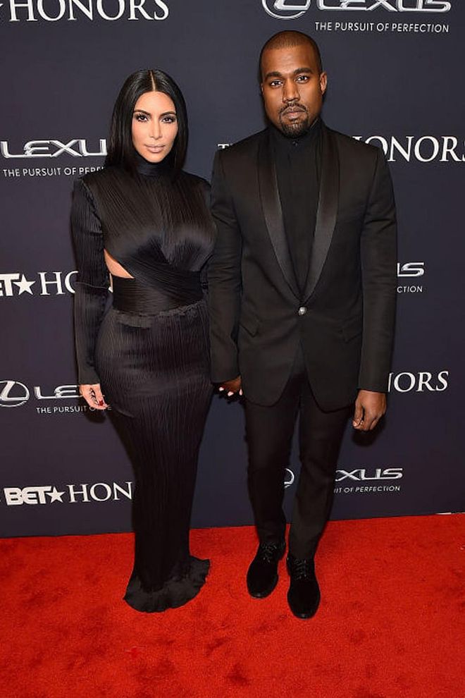 Kimye hits the red carpet in coordinating black satin looks at the BET Awards. Photo: Getty