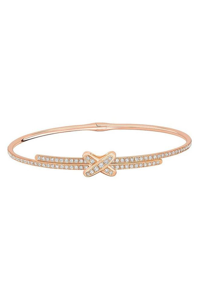 Chaumet's Premiers Liens bracelet includes the perfect amount of detail with brilliant-cut diamonds and a simple cross design.