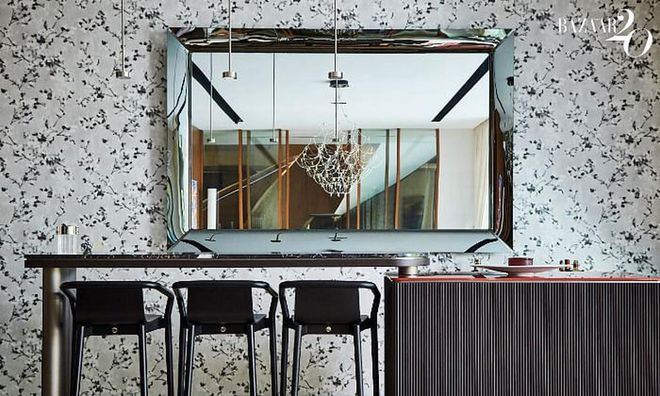 The bar in the formal
dining room, with a mirror by Philippe Starck for Fiam Italia.