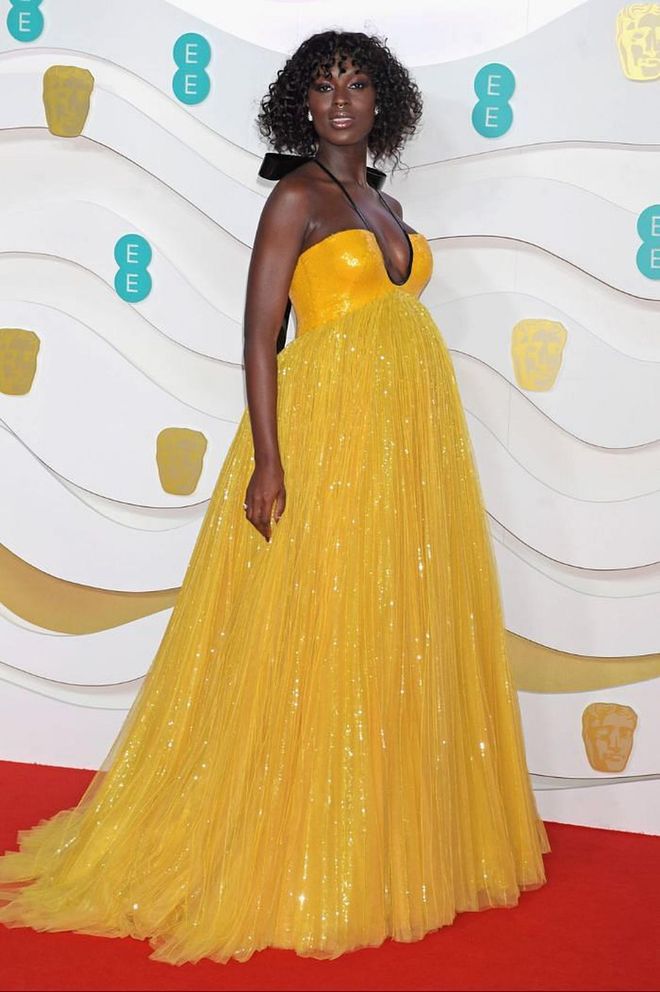 Jodie Turner-Smith embodied sunshine in a yellow gown by Gucci.

Photo: David M. Benett / Getty