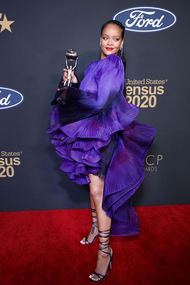 Rihanna wore a purple ruffled dress from Givenchy Haute Couture, Manolo Blahnik satin heels, a 38-carat Kallati amethyst diamond ring and Chopard jewellery while accepting the NAACP President's Award at the 51st NAACP Image Awards in Pasadena, California.