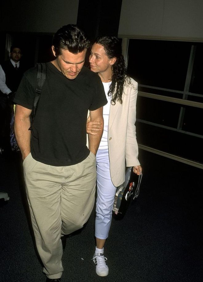 Returning from a vacation in Hawaii in 1999. Photo: Getty 