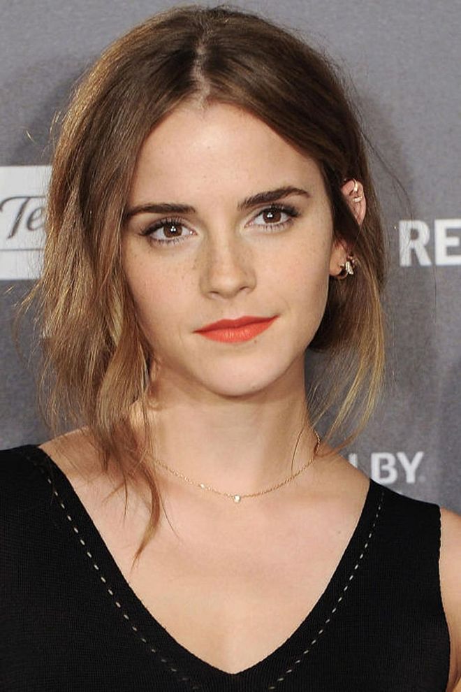 With bleached ends and a center-part, this undone red carpet hairstyle is a subtle departure for Watson.