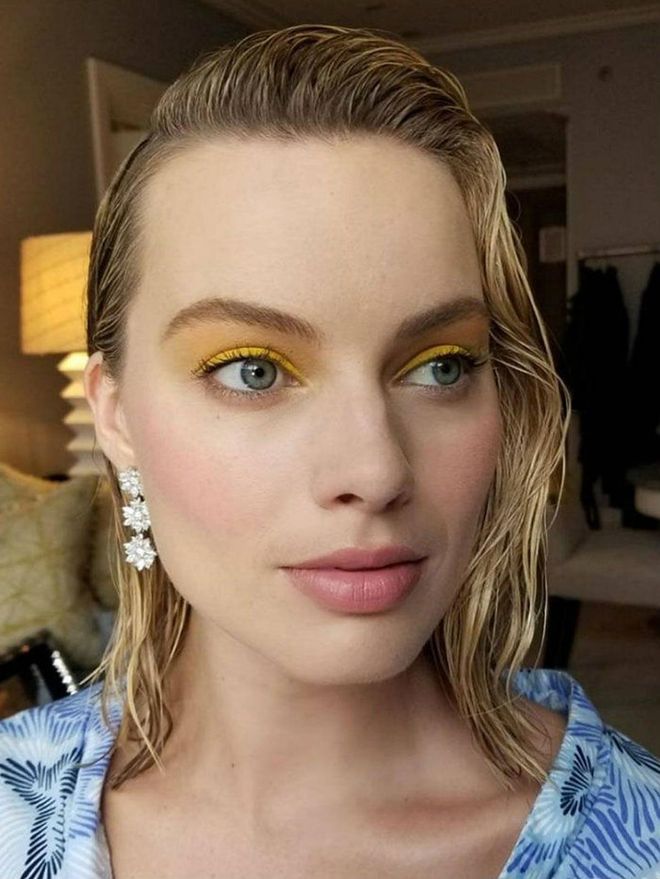 Yellow is a makeup color we love in theory, but it's incredibly tricky to wear unless you have super-rich dark skin. Margot Robbie gave us a lesson in color theory this year with a wash of yellow shadow swept across her lids and toward her brows. Paired with natural pink lipstick and blush, yellow eyeshadow can be gorgeous.
