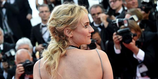 If you can't decide between wearing your hair up or down—do both, like Diane Kriger's twisted and textured half-up style at the recent Cannes Film Festival. Photo: Getty 