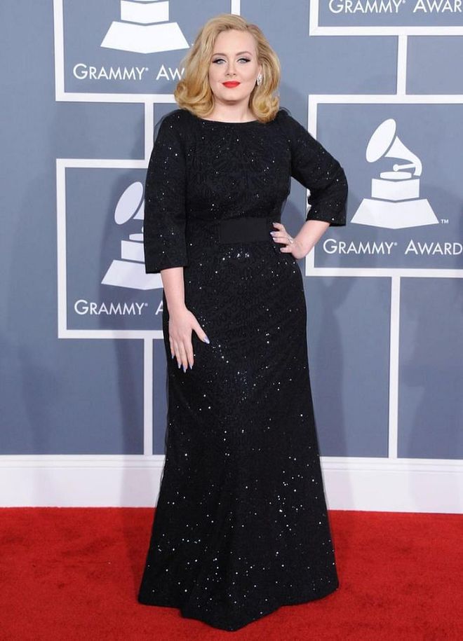 Looking like Old Hollywood glamour, Adele slayed the 2012 Grammy red carpet in a sparkling black gown by Giorgio Armani.