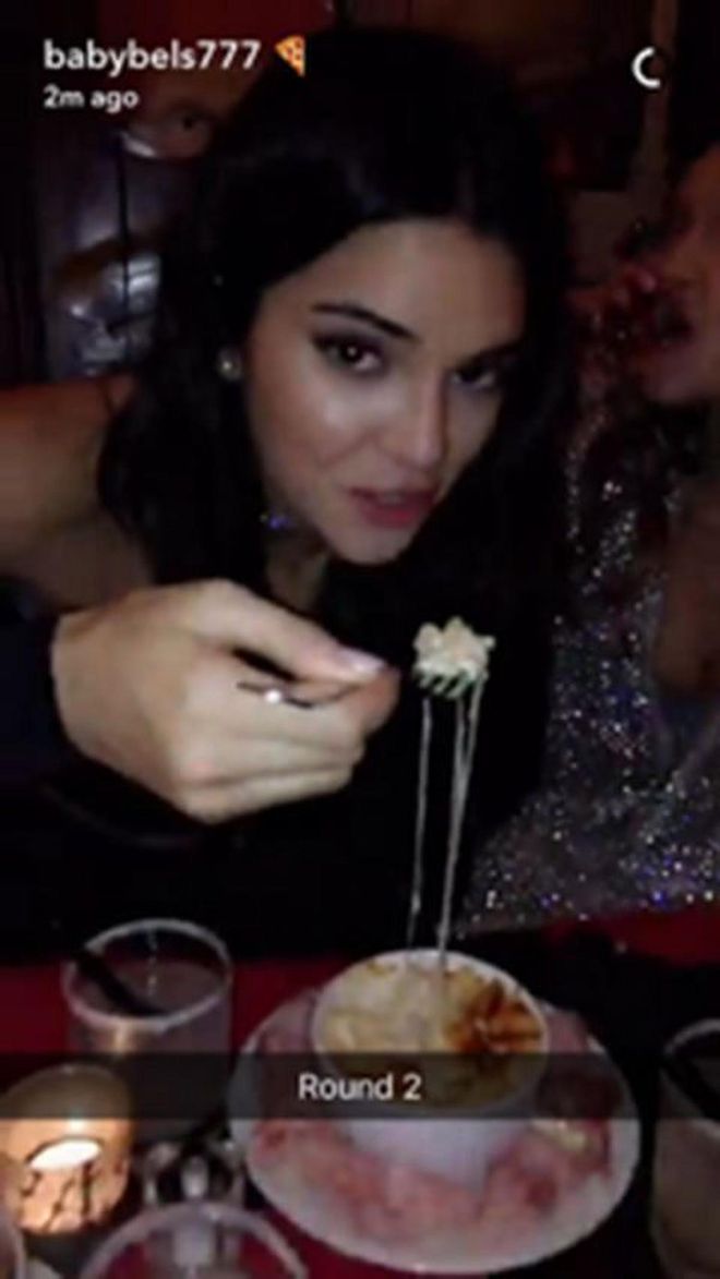 Eating: mac and cheese. Wearing: Her post-VSFS finery.
Photo: Snapchat