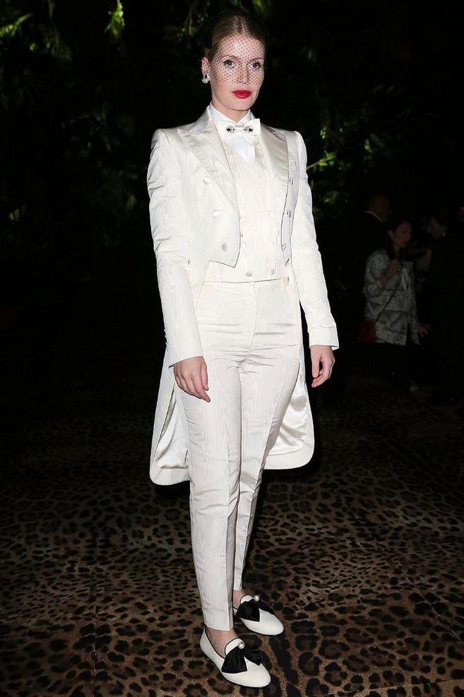 Kitty Spencer wore white tailoring to sit front row at the Dolce &amp; Gabbana show.

Photo: Getty Images