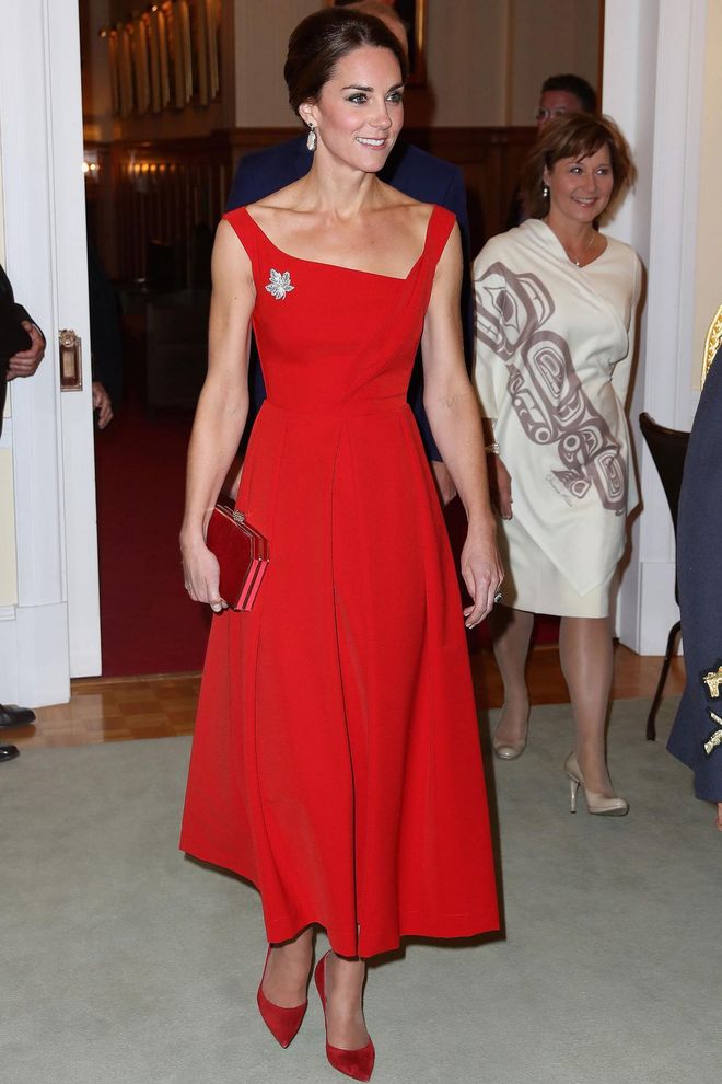 For her first formal event of the visit, the Duchess channeled Canadian red with a bright sleeveless gown by Preen and matching Russell and Bromley pointed-toe pumps and a clutch, topped with a crystallized maple leaf brooch and drop pendant earrings. Photo: Getty