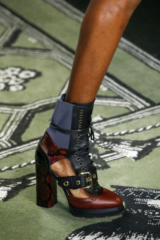 Seen in: London Fashion Week SS17 // Reason to love: Block-heeled booties have always been a footwear of choice for cool girls out there. Mix buckles, cutout details and panels in lustrous leather and exotic skin together and you have the perfect formula for shoes that will make your heart melt (Photo: Getty)