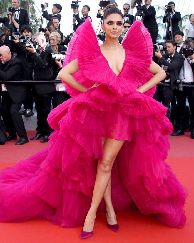 Another memorable moment from the Cannes red carpet; Padukone wore an equally scene-stealing tulle dress back in 2018, in the form of this fuchsia pink gown by Ashi Studio.

Photo: Mike Marsland / Getty