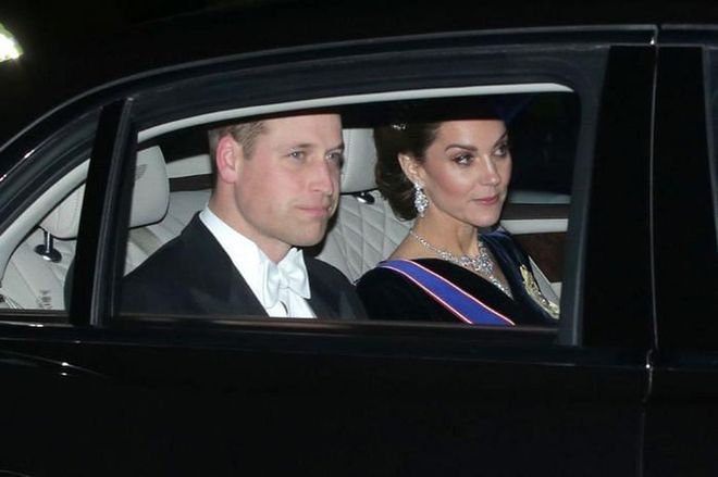 Prince William, Duke of Cambridge, and Catherine, Duchess of Cambridge, en route to Buckingham Palace to attend the Diplomatic Corps Reception.

Photo: Getty