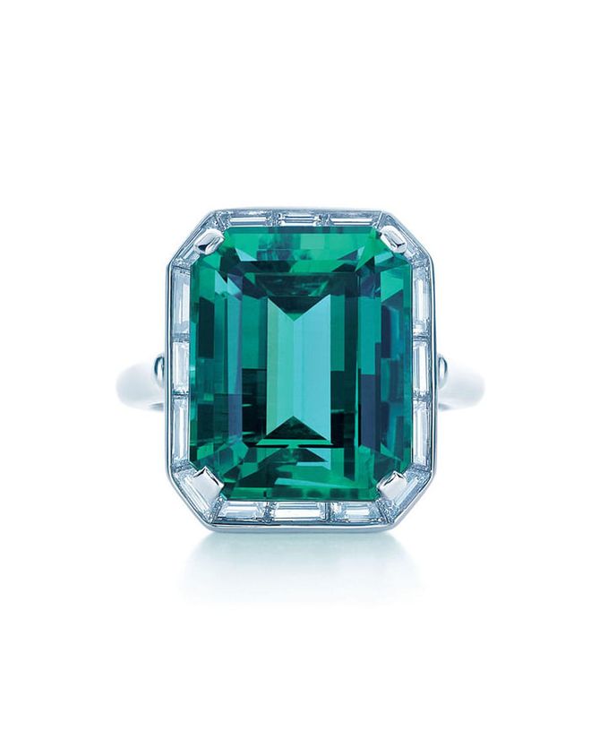 Emerald ring with diamond baguettes in platinum, price upon request, tiffany.com.
