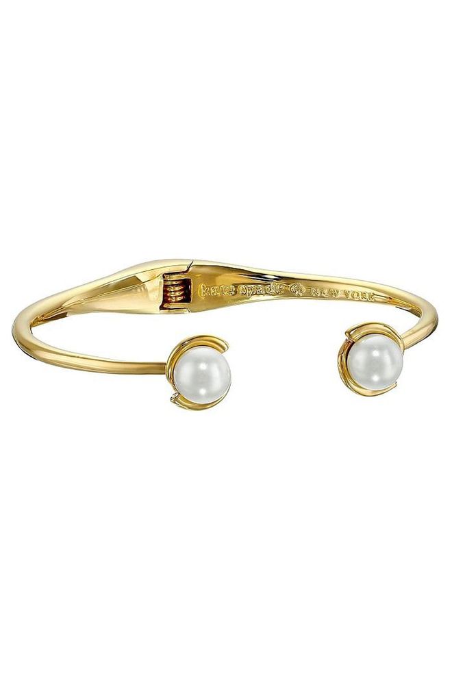 Add a playful yet chic bangle to your collection with this simple hinged bracelet from Kate Spade. 