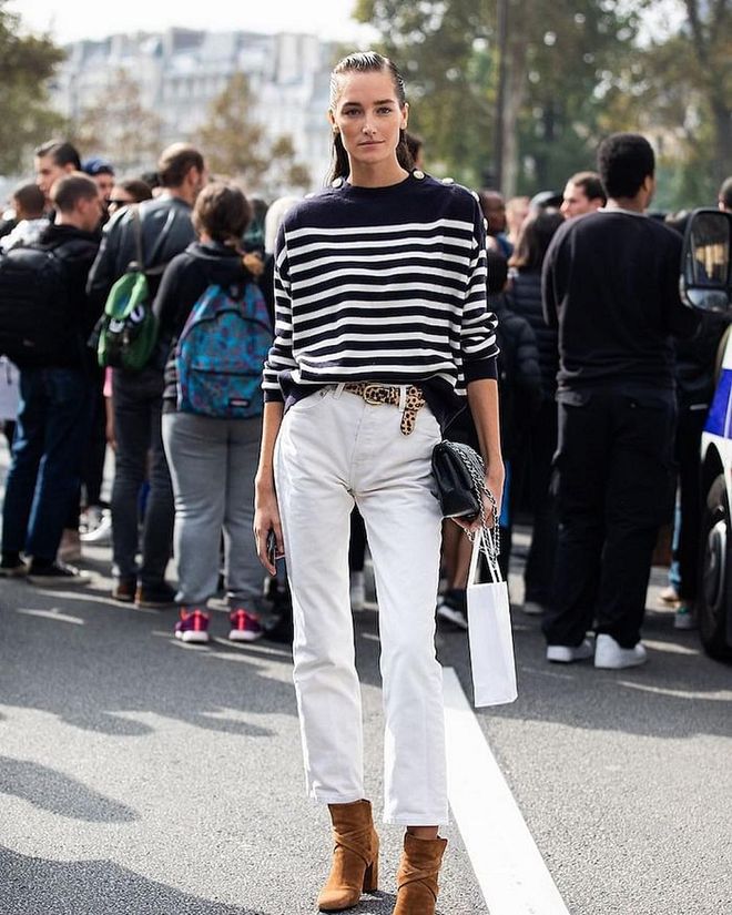 For a casual and classic ensemble, wear your favorite striped sweater with white jeans and a pair of suede booties; the variety in this look is easy to recreate for the weekend. Photo: Instagram/@sandrasemburg
