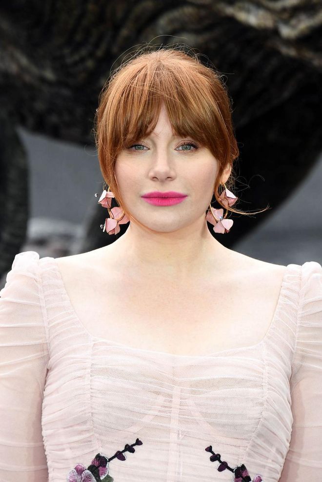 Heavy bangs parted down the middle like Bryce Dallas Howard's lend a fashion-y touch to that awkward growing out phase.
Photo: Getty