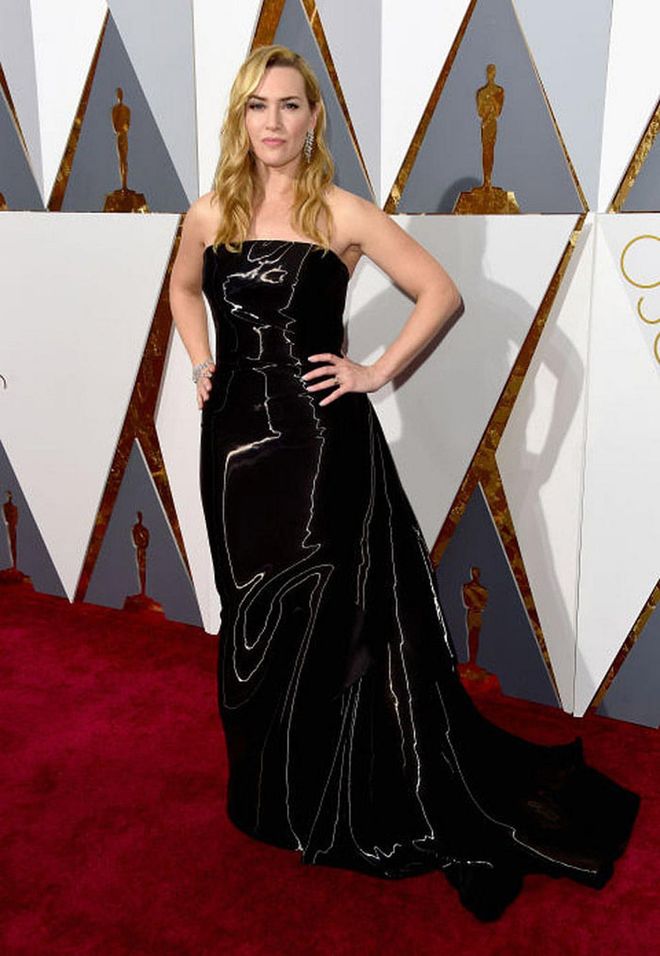Winslet showed off an unconventional Ralph Lauren creation on the carpet that became one of the most talked about gowns of the evening. But her best accessory of the night? Posing with her Titanic co-star Leo DiCaprio after his first-time Oscar win for The Revenant.
