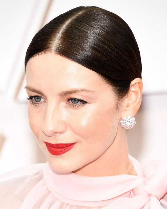 A flame-red lipstick made instant impact on Balfe, whose dark hair and blush gown contrasted the shade brilliantly. Her make-up artist used the Clains Joli Rouge Brillant Lipstick in Spicy Chilli, a hydrating satin-finish formula.