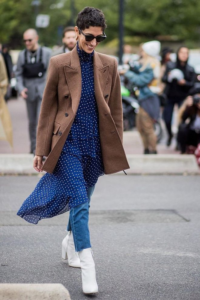 This winter, think of your jeans as a (very chic) alternative to tights. Not only will they help keep your summer dresses out for longer, but they will expand your footwear options and add a much cooler element to any ladylike look than tights ever could. Photo: Getty 