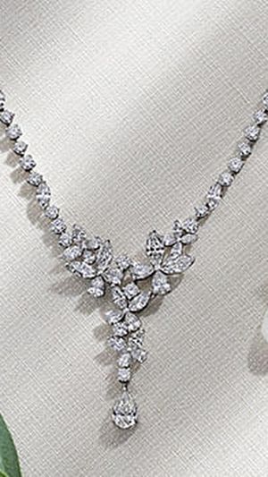 GRAFF Butterfly Collection multi-shape diamond necklace (17.71 carats); multi-shape diamond earrings (2.54 carats).