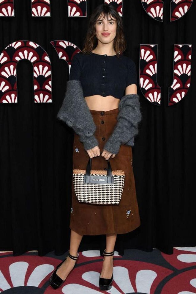 Jeanne Damas inspired our spring wardrobes in a floral embroidered skirt and cosy cardigan.

Photo: Pascal Le Segretain / Getty 