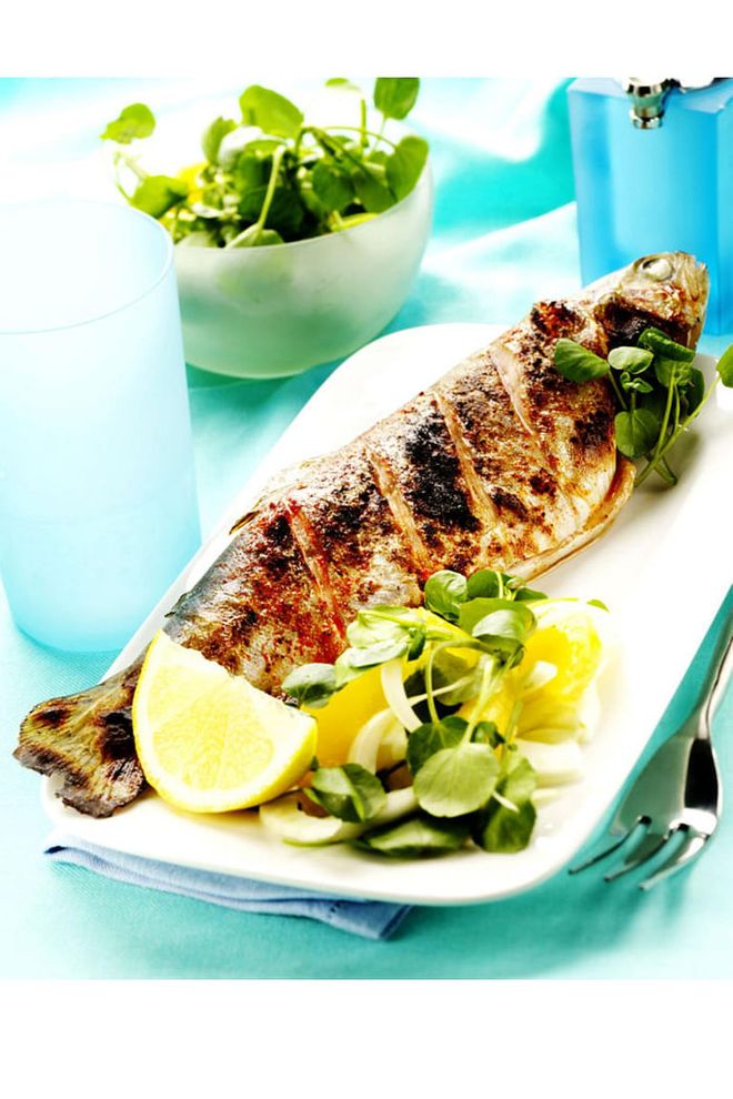"One of the most satisfying ways to eat and control weight is to include lean protein in every meal," Zidenberg-Cherr says, and research suggests that just digesting protein can burn a bunch of calories. Grilled fish is a perfect source of summertime protein because it's lighter and leaner than, say, a steak. (FWIW: Richer proteins such as steak can stick around in your stomach forever — which will keep you full, for sure, but won't necessarily make you feel your best in the heat.) Don't shy away from the fattier fish on the list above. They can contain omega-3 oil, which has been shown to reduce abdominal fat when combined with a weight loss program.