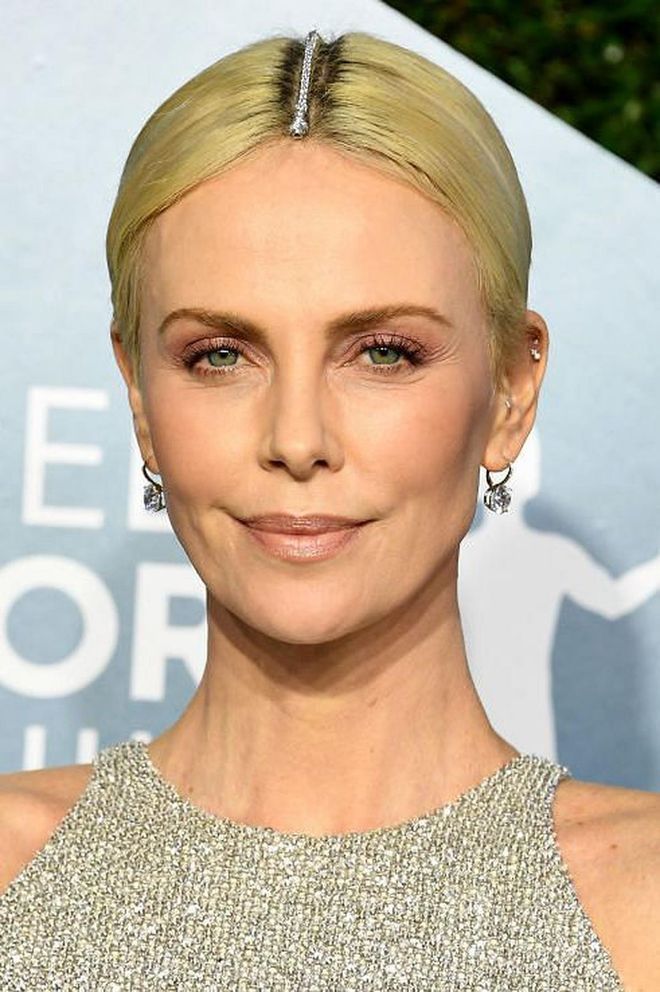 Charlize Theron's hair jewellery by super-stylist Adir Abergel wasn't any old party piece, but a $15,500 Tiffany &amp; Co. diamond bracelet. The look married with her crop top gown from Givenchy perfectly.

Photo: Steve Granitz / Getty
