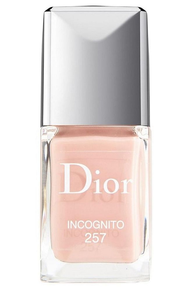 Shiny with just a hint of apricot, this polish is a full glow-up for your nails.

<b>Dior Vernis Gel Shine & Long Wear Nail Lacquer in Incognito, $27</b>