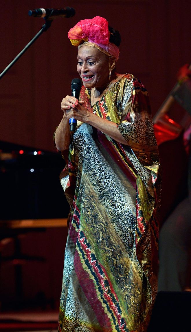 Dance the night away in a bright kaftan and coloured jewellery while listening to the soulful voice of Omara Portuondo of Orquesta Buena Vista Club. Photo: Getty