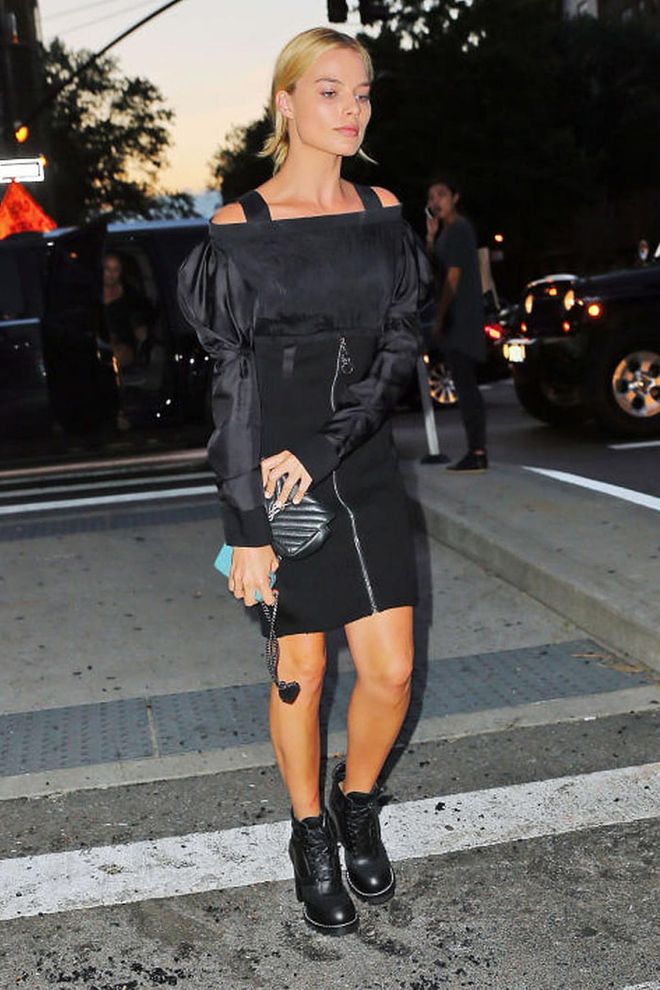 Margot Robbie in a Saint Laurent bag and off-the-shoulder look in New York.Photo: Splash