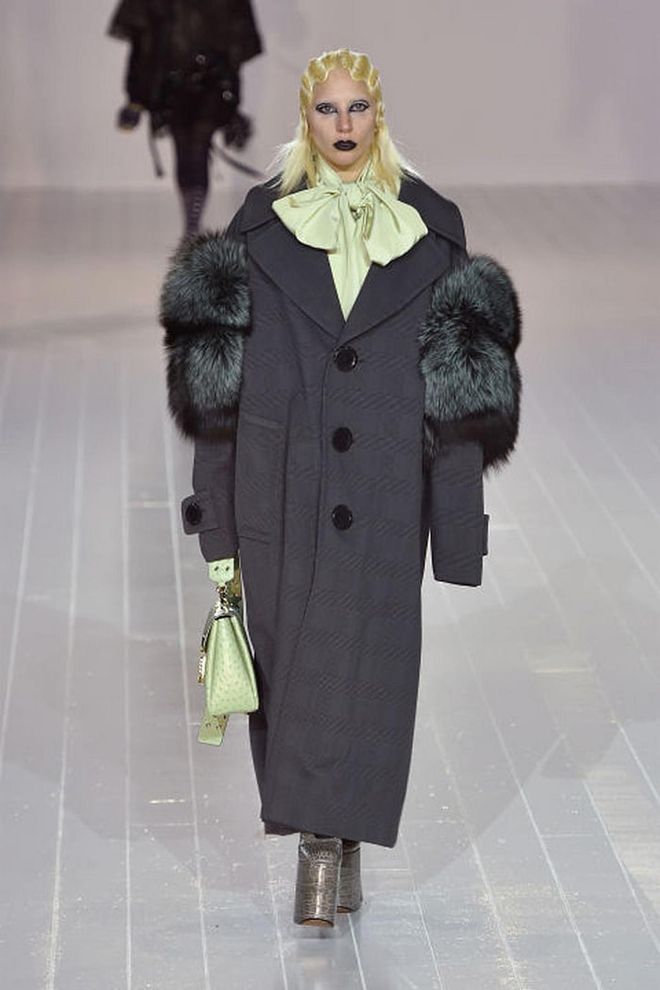 Hidden amongst the lineup of Marc Jacobs' Fall 2016 show was none other than Lady Gaga—who walked the runway in an oversized coat and towering platform heels. Like all the other models in the show, the singer had her hair bleached for the occasion. Gaga's appearance marked NYFW's biggest star-studded runway cameo of the season.