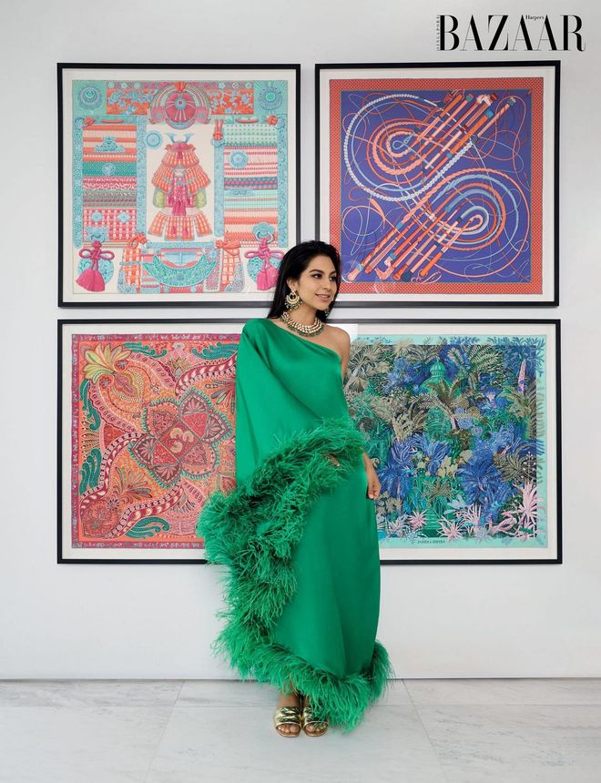 Kausar in a Taller Marmo dress, Louis Vuitton slippers, and a traditional kundan necklace and earring set.
