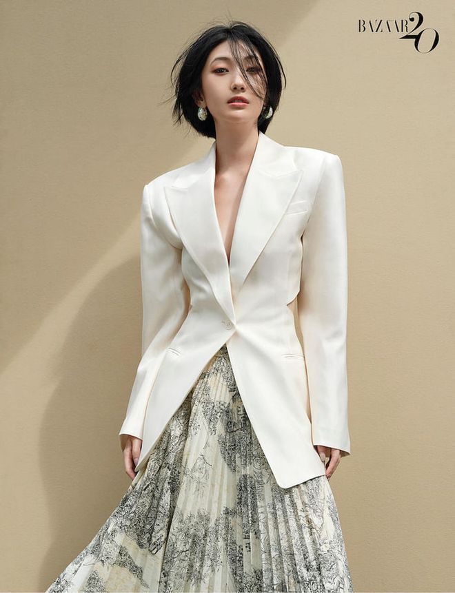 Blazer, by H&M; skirt, by Bottega Veneta; and earrings, Yao’s own. (Photo: Wee Khim)