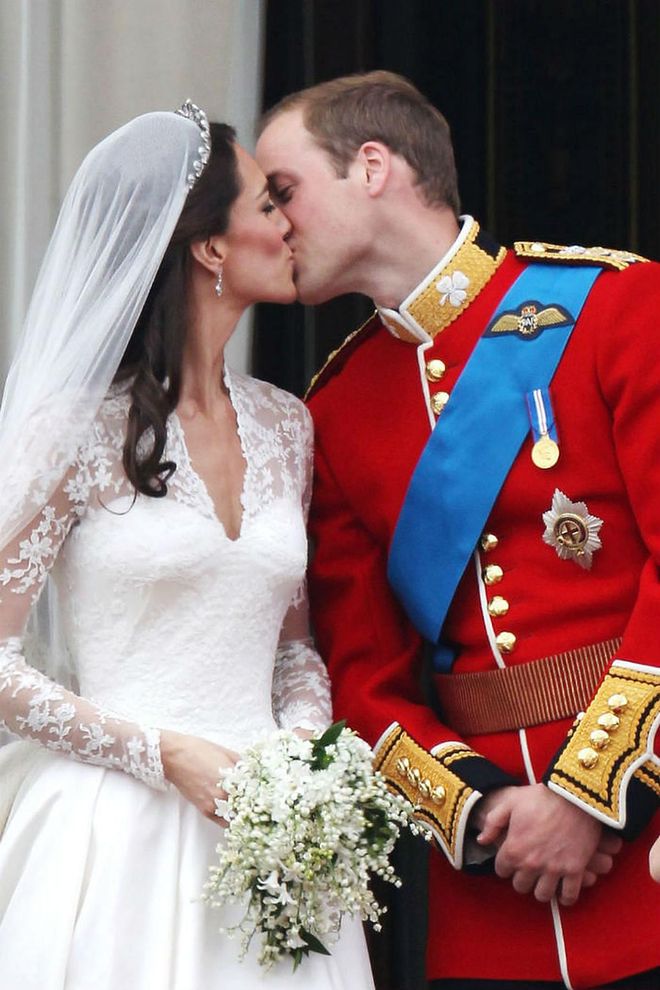 The couple satiate the crowd's cries (and start a new tradition) with a sweet kiss on the lips. And no, that wasn't an instant replay. The kiss between William and Kate on the balcony really did take place twice!
Photo: Getty
