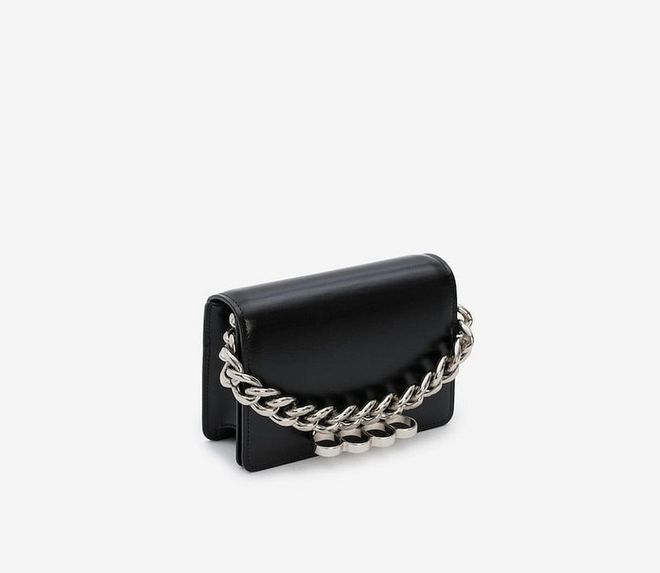 The Four Ring Mini With Chain In Black, $2,000, Alexander McQueen