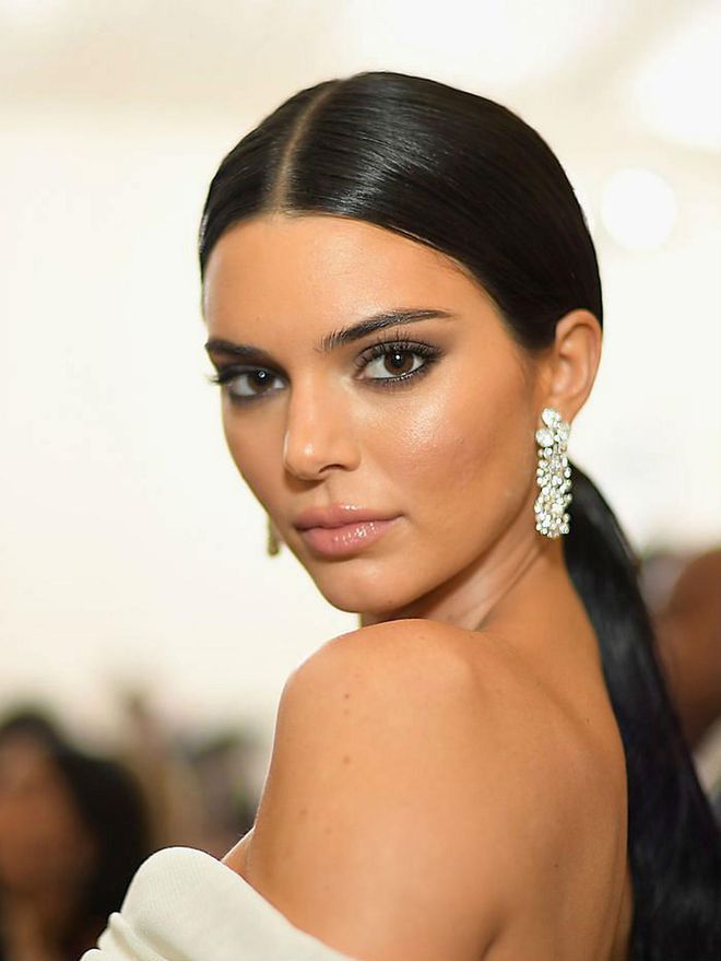 An extra-long slick ponytail and gray smoky eye for the 2018 Met Gala in New York City. Photo: Getty 