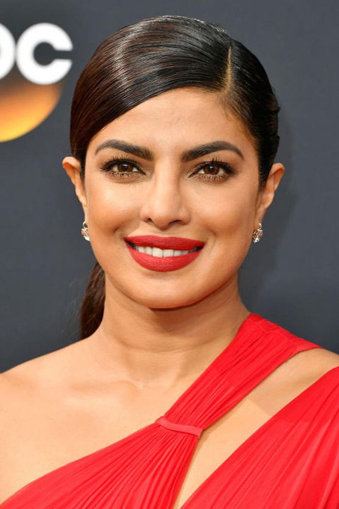 A matte red lipstick not only makes a bold statement, but it's a smart choice for a long, eventful night. We imagine Chopra won't have to reapply the lipstick even once (though we hope she had a tube stashed in her purse, just in case).