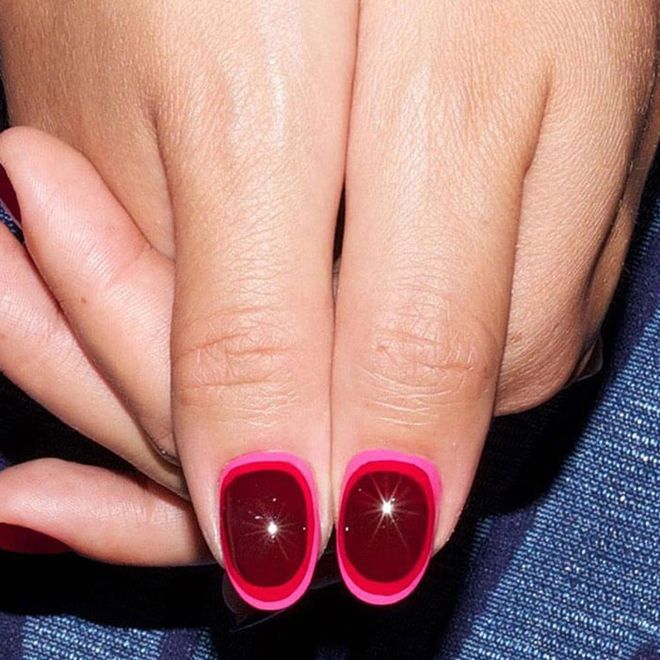 Burgundy over cherry on top of fuchsia makes for chic and vibrant layering. @aliciatnails