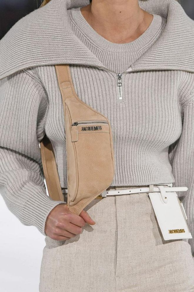 Expanding beyond the traditional '90s silhouette, the belt bag made an appearance on the fall/winter 2020 runways in fresh and new shapes that find the perfect balance between style and practicality, as seen here with Jacquemus.

Photo: Victor Virgile / Getty