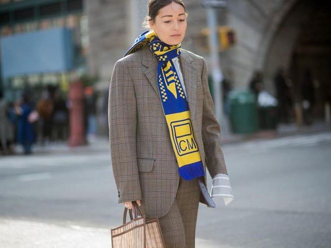 Rachael Wang wearing a football scarf during NYFW
Photo: Getty