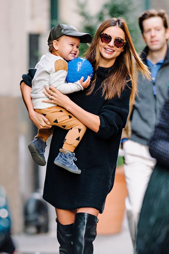 The model hasn't eschewed her chic model-off-duty style since becoming a mother. Those smiles are so aww-inducing!