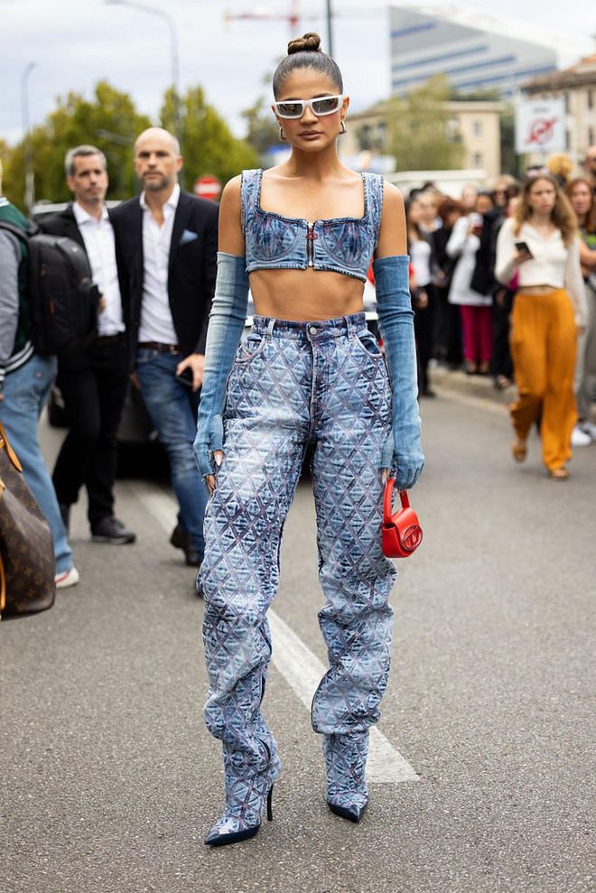 MILAN, ITALY - SEPTEMBER 21: Thassia Naves is seen wearing total denim and long gloves at Diesel show during the Milan Fashion Week - Womenswear Spring/Summer 2023 on September 21, 2022 in Milan, Italy. (Photo by Valentina Frugiuele/Getty Images)